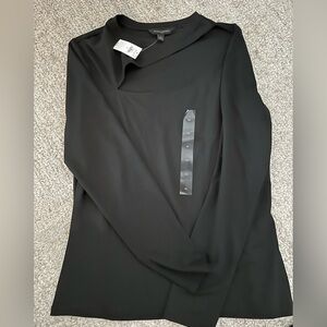 Asymmetrical cutout black top